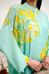 Flowing silk blend jalabiya with oversized floral print
